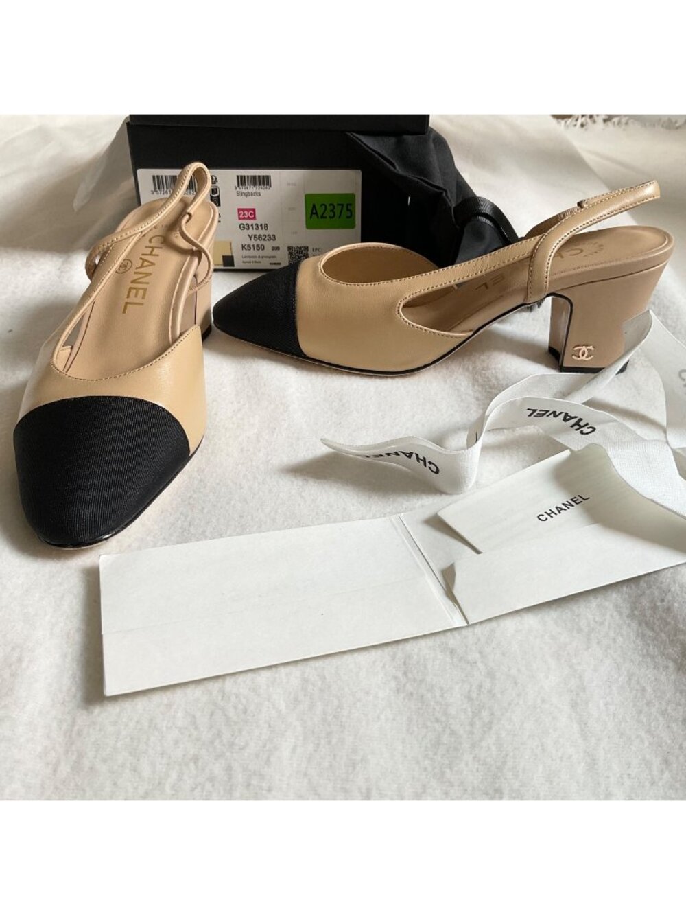 NWB CHANEL Interlocking TWO tone black beige Leather Slingback Pump 37 heels6.5